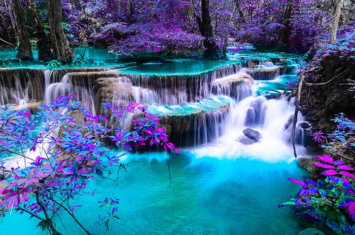 Amazing waterfal in colorful autumn forest in Kanchanaburi Thailand