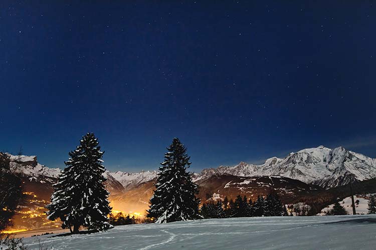 beautiful christmas landscape with night stars on blue winter sky